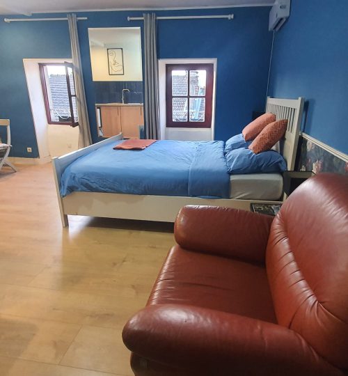 Bed and living room